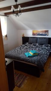 Postel nebo postele na pokoji v ubytování Casa Ursului