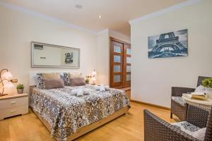 Postel nebo postele na pokoji v ubytování Villa Leonardo Dos by Villa Plus + 15 fotografií