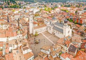 an aerial view of a city with buildings at Comodo appartamento [Trento centro] Il Duomo Bianco in Trento +4 photos