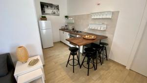 Kuchyňa alebo kuchynka v ubytovaní Casa Marta + 5 fotografií