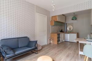 Kuchyňa alebo kuchynka v ubytovaní Appartement confortable au cœur de Nantes
