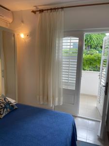 En eller flere senge i et værelse på apartmani Isabella - Ilda Radonic