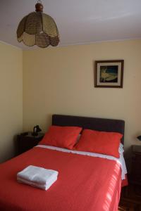 Postel nebo postele na pokoji v ubytování Hostal Donde Alberto