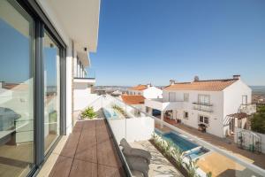 a view from the balcony of a house at Casa do Sol - By SCH in Salir de Porto