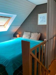 En eller flere senger på et rom på De Bosdreef - Hengelhoef - duplex met verwarmd openluchtzwembad