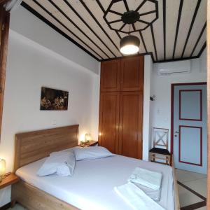 Posteľ alebo postele v izbe v ubytovaní Vrionis House + 28 fotografií