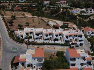 an aerial view of a villa in a suburb at Apartamento Neptuno in Benagil