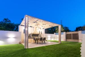 Gambar di galeri bagi Artemis Luxury Villa di Méson Yerakaríon