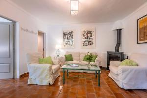 A seating area at Villa Rafaleta by Villa Plus