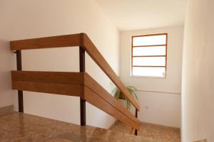Letto o letti in una camera di Mimice View