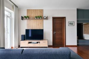 TV a/nebo společenská místnost v ubytování Apartman Residence Moser 1504