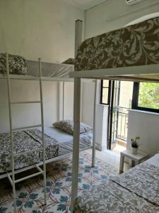 Postel nebo postele na pokoji v ubytování Hostel On