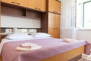 Letto o letti in una camera di Mimice View