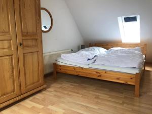 Postel nebo postele na pokoji v ubytování Moin im schönen Friesenhof