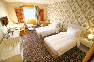 The George Hotel by Saffron, Dubai Creek客房内的一张或多张床位
