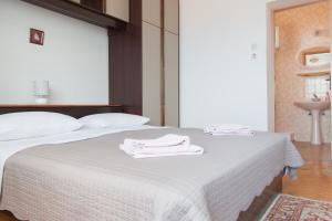 Letto o letti in una camera di Mimice View