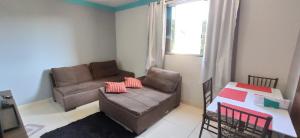 Χώρος καθιστικού στο Apartamento Mobiliado, Parque Atheneu.