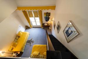 Posezení v ubytování Hôtel Le Y