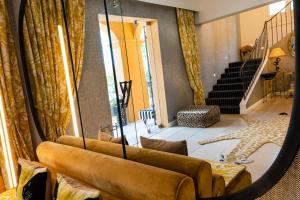 Posezení v ubytování Hôtel Le Y