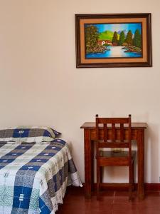 Vuode tai vuoteita majoituspaikassa La Posada Copan