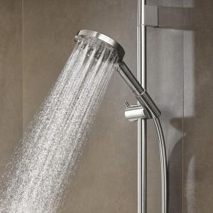 a shower head with a stream of water in a bathroom at Boutique Barclay House London townhouse in London