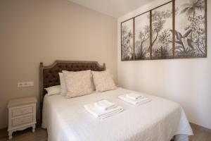 Llit o llits en una habitació de Apartamento Entrecatedrales