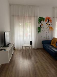 Televízia a/alebo spoločenská miestnosť v ubytovaní La casa di Gianfry