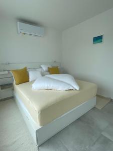 Voodi või voodid majutusasutuse Izi Apartman toas