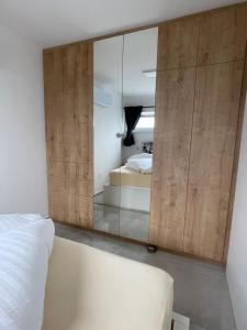 Voodi või voodid majutusasutuse Izi Apartman toas