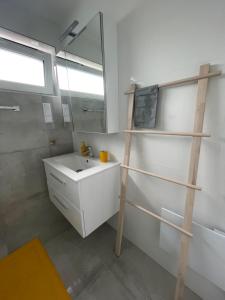 Vannituba majutusasutuses Izi Apartman +15 fotot