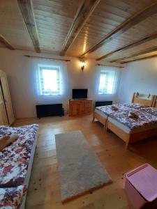 Postel nebo postele na pokoji v ubytování Chalupa Pod Menhiry