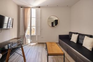 TV a/nebo společenská místnost v ubytování Apartamento Entrecatedrales 2