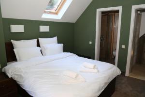 A bed or beds in a room at Villa Ema