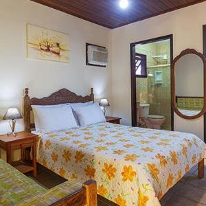 Giường trong phòng chung tại Pousada Village Paraty Centro