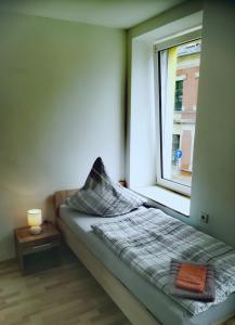 Cama o camas de una habitación en Ferienwohnung Karsten - nahe Chemnitz
