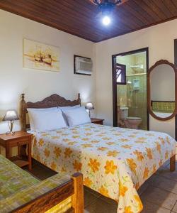 Giường trong phòng chung tại Pousada Village Paraty Centro +103 ảnh