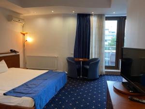 Postel nebo postele na pokoji v ubytování Samaa Hotel + 37 fotografií