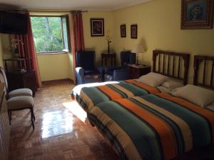 Cama o camas de una habitación en Caserío Maribel