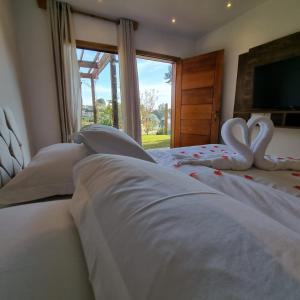 Recanto dos Moinhos - Boutique Hotel客房内的一张或多张床位