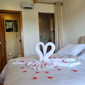 Recanto dos Moinhos - Boutique Hotel客房内的一张或多张床位