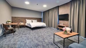 Posteľ alebo postele v izbe v ubytovaní ABA Apartments