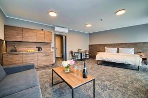 Posteľ alebo postele v izbe v ubytovaní ABA Apartments