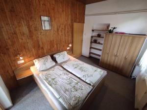 Postel nebo postele na pokoji v ubytování Apartmány Vranov