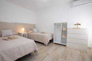 Postel nebo postele na pokoji v ubytování Apartamento San Juan