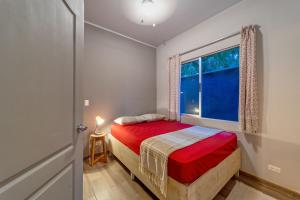 Postel nebo postele na pokoji v ubytování Casa Jobo