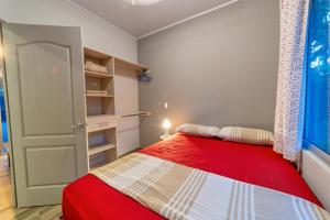 Postel nebo postele na pokoji v ubytování Casa Jobo
