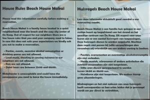 a sign for a house rules beach house market at Beach House Makai - family house with Finnish Sauna, 2 bathrooms and only minutes from the Beach in De Koog