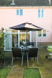 Patio nebo venkovní prostory v ubytování Pinky Cottage