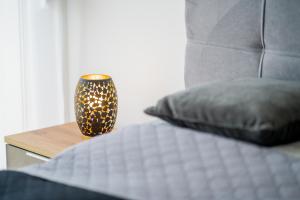Posteľ alebo postele v izbe v ubytovaní Kincső Apartman