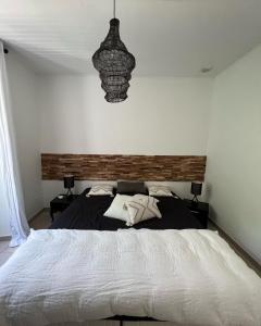 Postel nebo postele na pokoji v ubytování Mas Saint Laurent